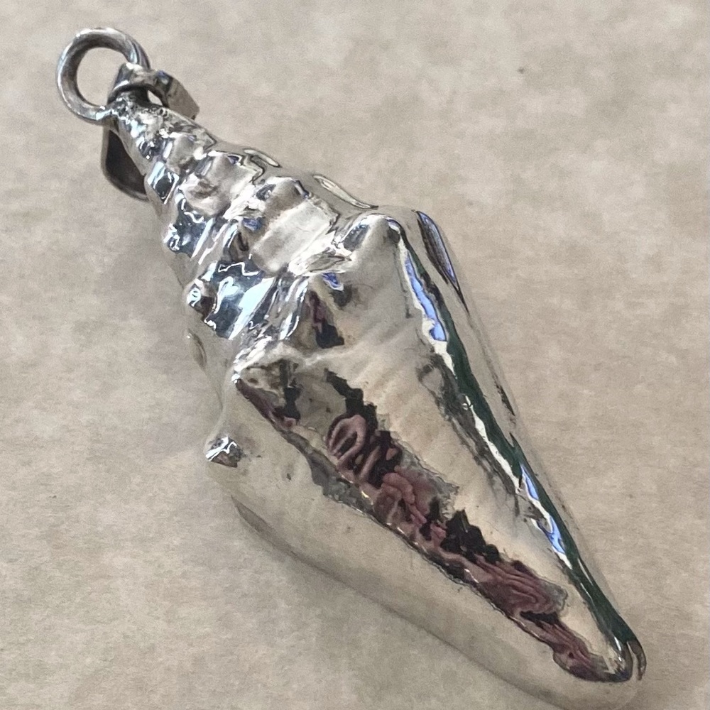 Sterling silver large conch shell pendant.